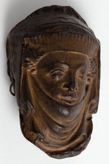 Cast of head of a woman wearing a veil, from Lichfield Cathedral?. Creator: Unknown