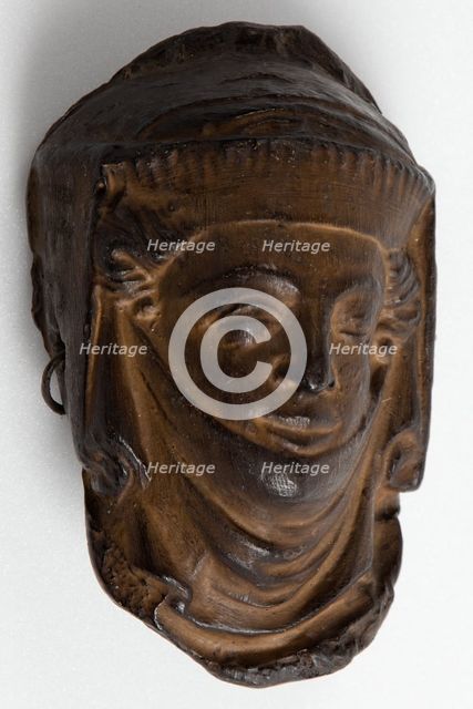 Cast of head of a woman wearing a veil, from Lichfield Cathedral?. Creator: Unknown.