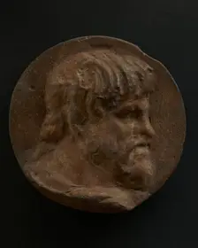 Cast of head of bearded Dacian in cloak. Creator: Unknown