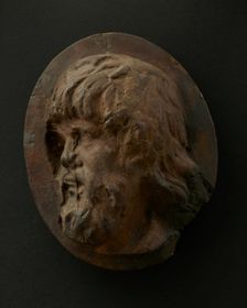 Cast of head of Dacian with long flowing hair and beard. Creator: Unknown