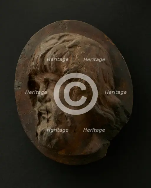 Cast of head of Dacian with long flowing hair and beard. Creator: Unknown.