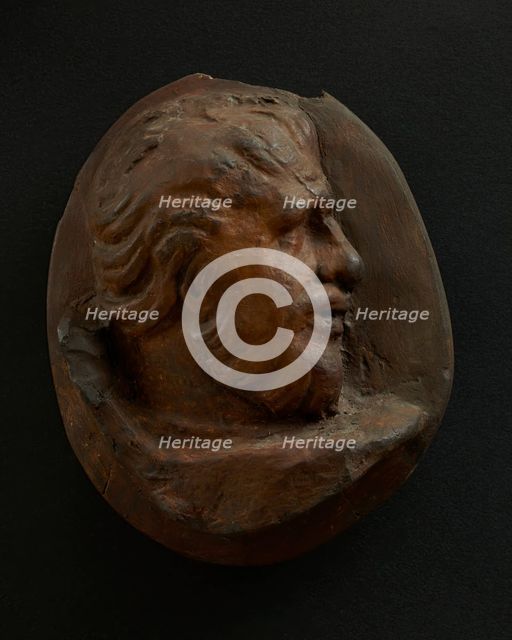 Cast of head of Dacian man with swept back hair. Creator: Unknown.
