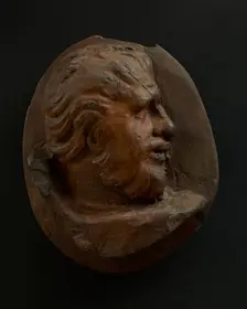 Cast of head of Dacian man with swept back hair. Creator: Unknown