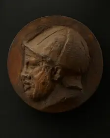 Cast of head of deceased or sleeping Roman auxiliary in helmet. Creator: Unknown