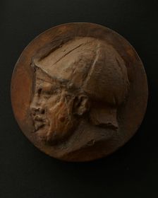 Cast of head of deceased or sleeping Roman auxiliary in helmet. Creator: Unknown
