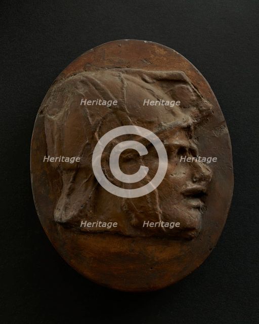 Cast of head of Eastern archer with helmet. Creator: Unknown.