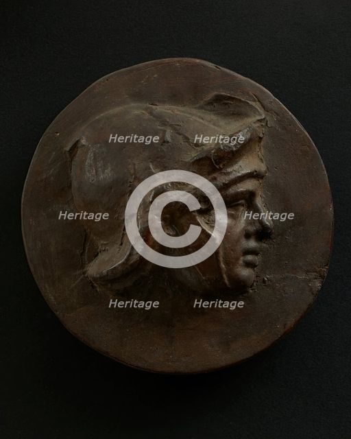 Cast of head of full-faced, young Roman soldier in helmet. Creator: Unknown.
