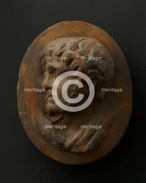 Cast of head of lightly-bearded man wearing wreath (?) and with mouth open. Creator: Unknown.