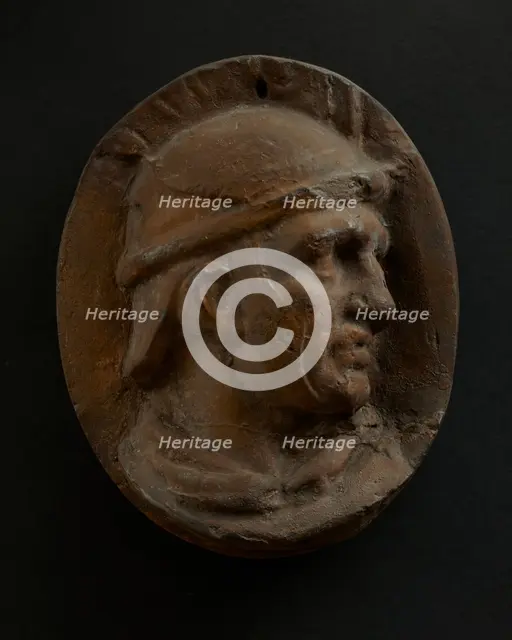 Cast of head of Roman auxiliary in round helmet. Creator: Unknown.