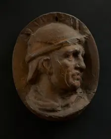 Cast of head of Roman auxiliary in round helmet. Creator: Unknown