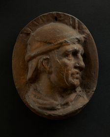 Cast of head of Roman auxiliary in round helmet. Creator: Unknown