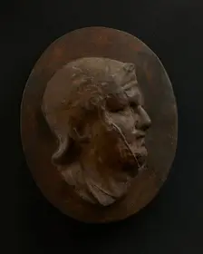 Cast of head of Roman soldier in helmet with bulging brow. Creator: Unknown
