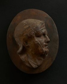 Cast of head of Roman soldier in helmet with bulging brow. Creator: Unknown