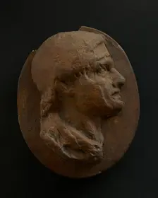 Cast of head of Roman soldier with creased brow. Creator: Unknown