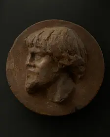 Cast of left profile of Dacian man with full hair and beard. Creator: Unknown