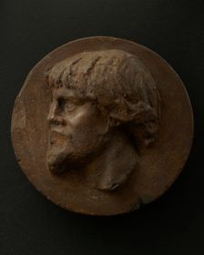 Cast of left profile of Dacian man with full hair and beard. Creator: Unknown