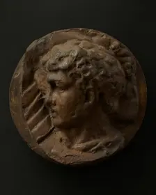 Cast of left profile of legionary with hammer in hand. Creator: Unknown