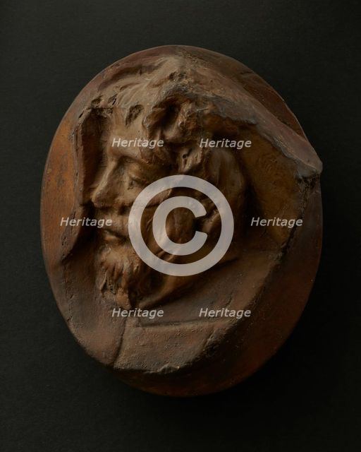Cast of severed Dacian head held by a right hand.  Creator: Unknown.