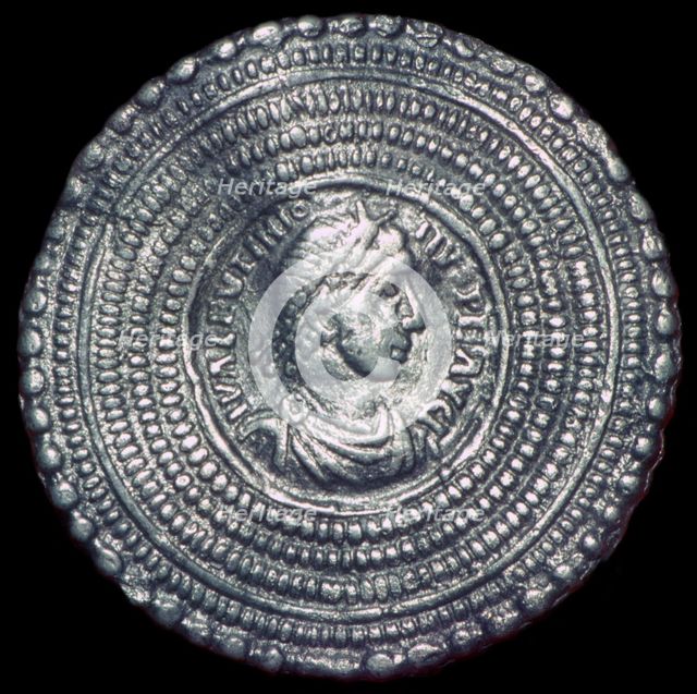Cast silver disc-brooch. Artist: Unknown