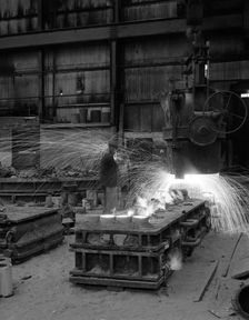 Casting a 1 in 14 rail crossing, Sheffield, South Yorkshire, 1964. Creator: Michael Walters