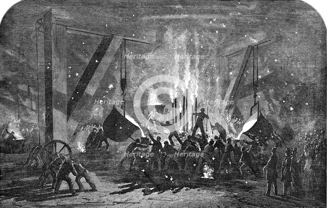 Casting a Monster Cylinder, at Messrs. Scott Russell and Co.'s Building-Yard, Millwall, 1854. Creator: Unknown.