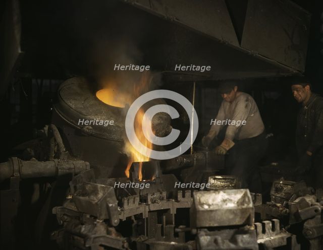 Casting a billet from an electric furnace, Chase Brass and Copper Co., Euclid, Ohio, 1942. Creator: Alfred T Palmer.