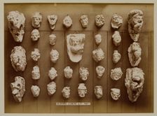 Casts of Gothic heads, possibly from York stalls, 1876. Creator: Bedford Lemere and Company