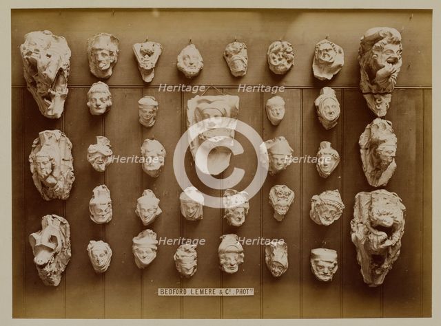 Casts of Gothic heads, possibly from York stalls, 1876. Creator: Bedford Lemere and Company.