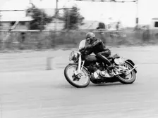 CE Mills riding a 998cc Vincent, Silverstone, Northamptonshire, 1959