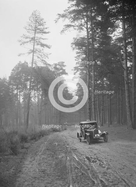 Cecil Randall's Talbot taking part in the JCC General Efficiency Trial, Oxshott Woods, Surrey, 1923. Artist: Bill Brunell.