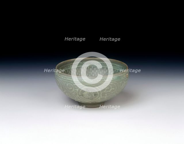 Celadon bowl with inlaid design of storks amid clouds, Koryo dynasty, Korea, 13th century. Creator: Unknown.