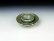 Celadon cupstand with incised floral decoration, Koryo dynasty, Korea, 1150-1200. Creator: Unknown