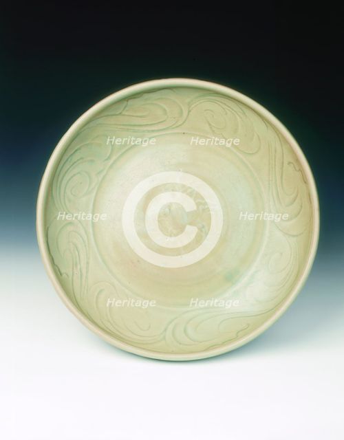 Celadon dish with moulded tree and incised scrolls, Yuan-Ming dynasty, China, 14th century. Creator: Unknown.