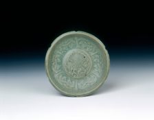 Celadon lobed saucer with moulded floral decoration of Liao type, Koryo dynasty, Korea, c1120-1130