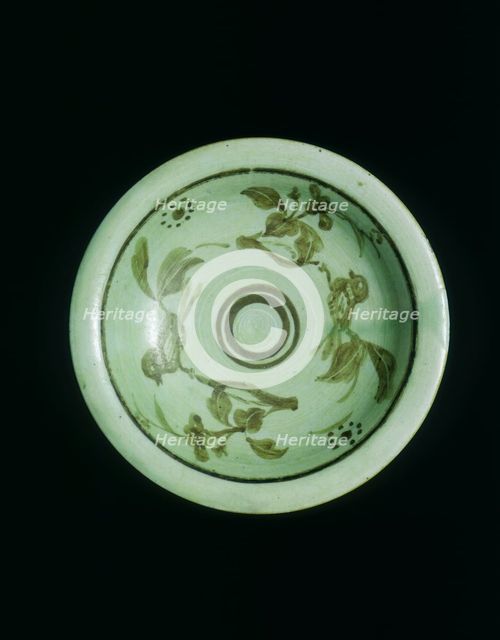 Celadon saucer with underglaze brown birds on branches, China, c1900. Creator: Unknown.