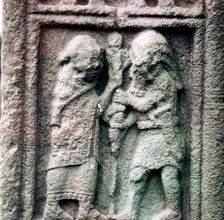 Celtic chief helps Christian priest to set up a staff, Clonmacnoise, Ireland