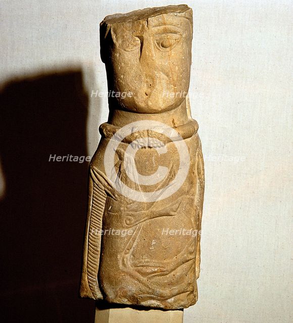 Celtic stone figure with torc and boar relief, Euffigneux, France. Artist: Unknown