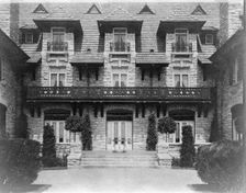 Center part of facade of home of Edmund Cogswell Converse, Greenwich, Connecticut, 1908. Creator: Frances Benjamin Johnston