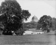 Central Park, New York, boat pond and Temple Beth-El, ca 1900. Creator: Unknown