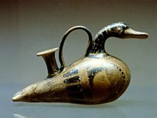 Ceramic baby bottle decorated as a duck, made in terracotta