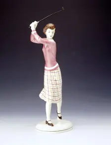 Ceramic figurine of a lady golfer, c1920s. Creator: Unknown
