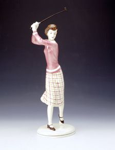 Ceramic figurine of a lady golfer, c1920s. Creator: Unknown