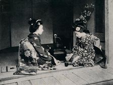 Ceremonial Tea served by a lovely lJapanese hands c1900, (1921). Artist: Julian Leonard Street