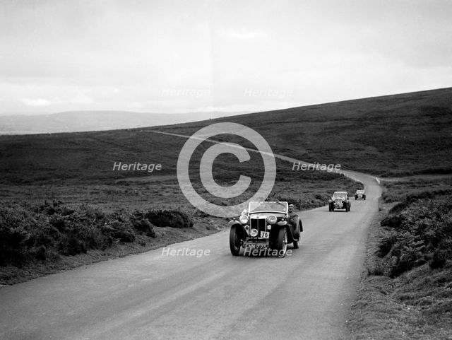 CH Richardson's MG PB ahead of a Singer B37 at the MCC Torquay Rally, July 1937. Artist: Bill Brunell.