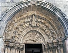 Church of Santiago, detail of the front door with sculpture of Santiago on horseback and Jesus Ch…