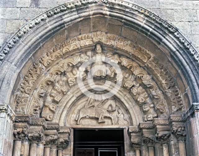 Church of Santiago, detail of the front door with sculpture of Santiago on horseback and Jesus Ch…