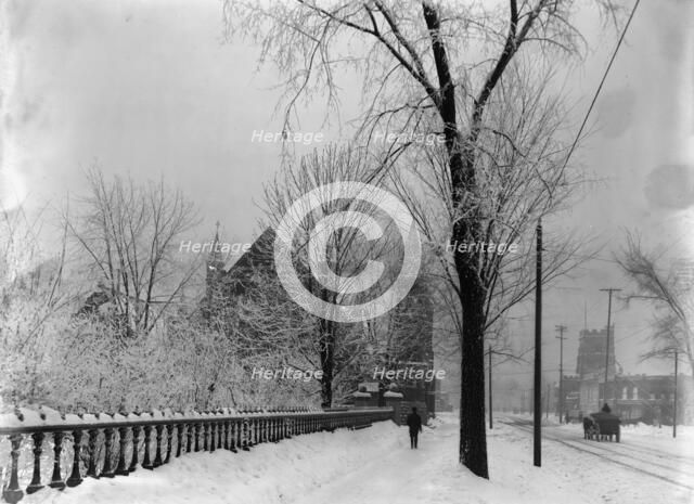 Church and Grand River Avenue in snow, Detroit, Mich., between 1900 and 1905. Creator: Unknown.