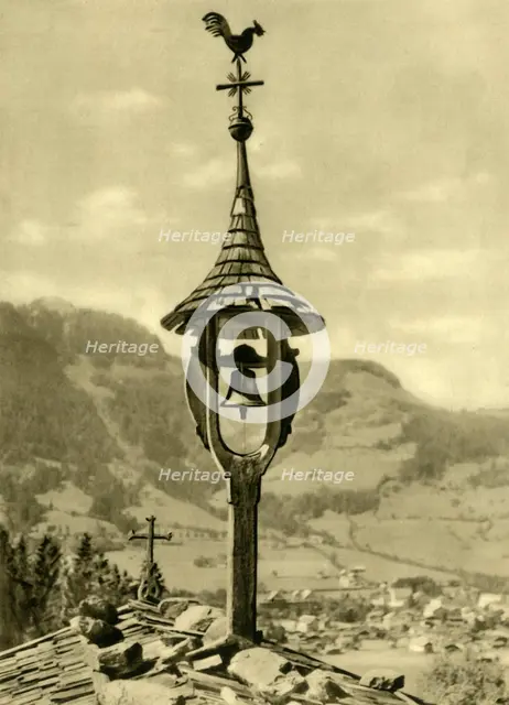 Church bell and weather vane, Kitzbühel, Tyrol, Austria, c1935. Creator: Unknown.