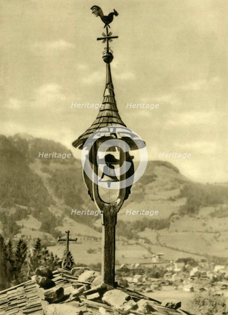 Church bell and weather vane, Kitzbühel, Tyrol, Austria, c1935. Creator: Unknown.