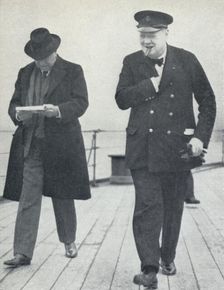 Churchill, jubilant, aboard H.M.S. Prince of Wales with Lord Beaverbrook, about to say farewell t